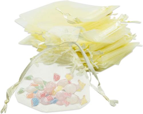 Et sæt beige organza tasker