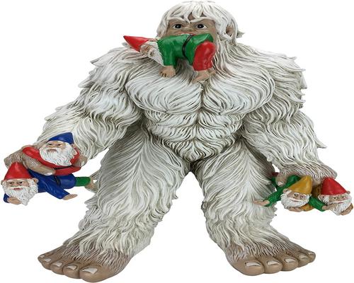 a Large Gnome Figurine With Yeti